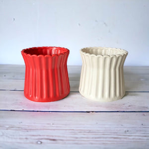 Red and White ribbed plant cover pot
