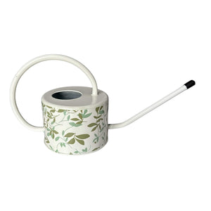 white tin watering can with leaf design