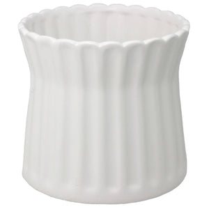 white ceramic scalloped pot