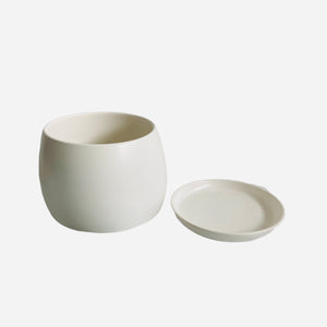 White ceramic plant pot with saucer