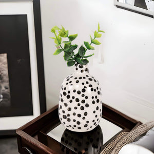 white and black polka dot ceramic vase